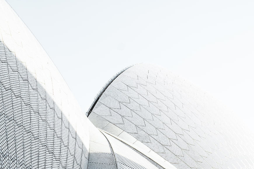Modern white architectural dome with geometric grid pattern