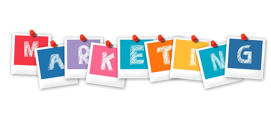 Marketing spelled out on colorful polaroid photos