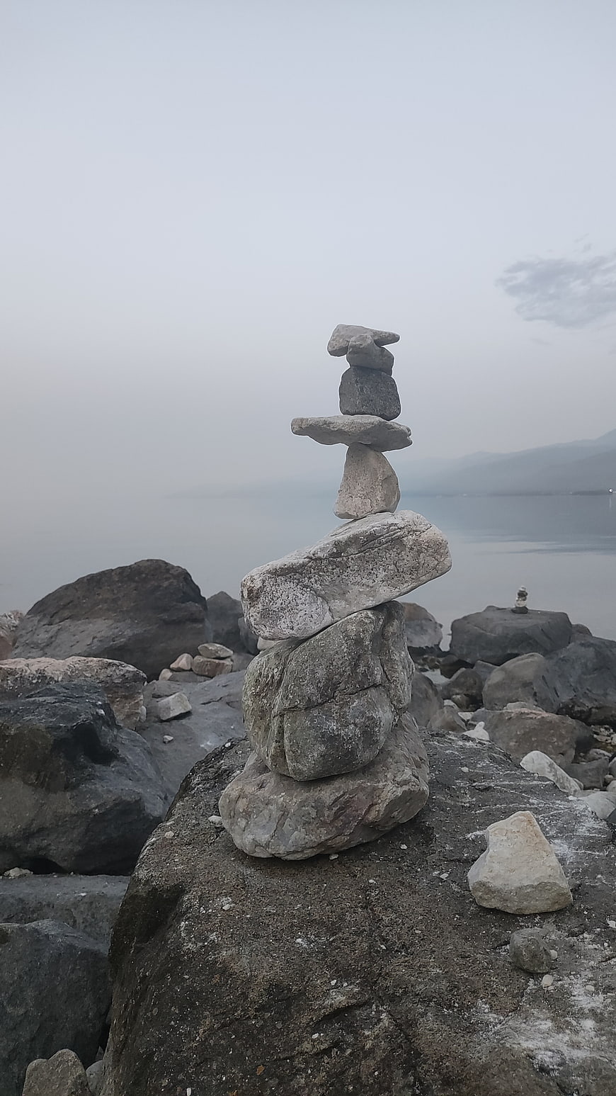 Stone Cairn Pyramid on Lake Baikal Shore