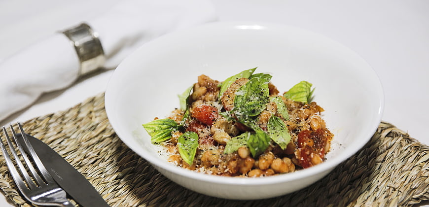 Gourmet Chickpea Salad with Basil and Tomatoes in White Bowl