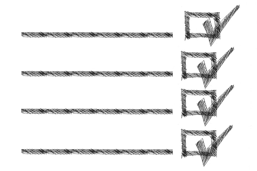 Hand-drawn sketch of a checklist with four hatched lines and checkmarks