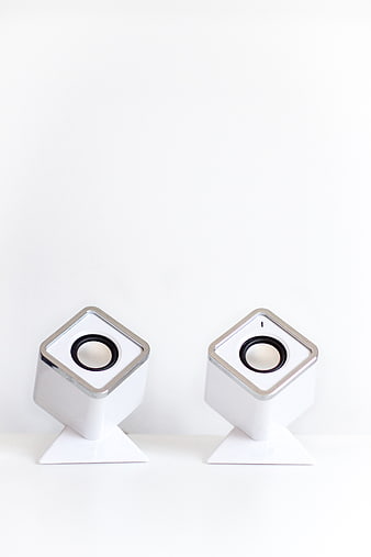 Minimalist White Cube Speakers on White Background