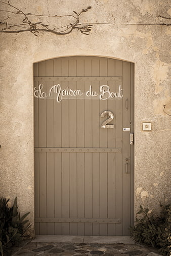 Rustic French Door with La Maison du Bout Sign