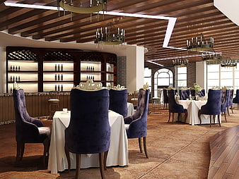Luxurious restaurant interior with purple velvet chairs and wine cellar