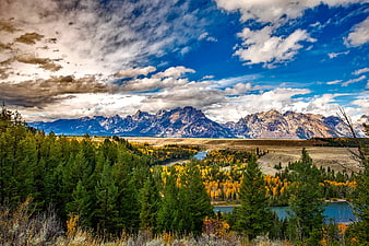 Grand Teton Mountain Range With Snake River And Autumn Forests