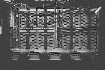 Close-up of server rack with cables and cooling fans