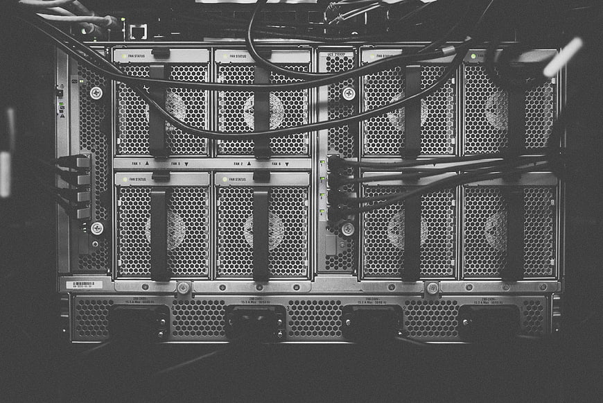 Close-up of server rack with cables and cooling fans