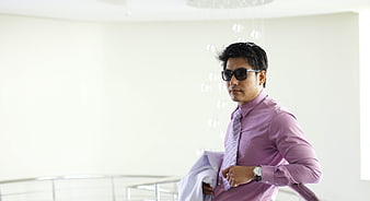Confident Businessman in Pink Shirt and Sunglasses