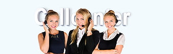 Three female call center agents with headsets smiling