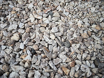 Close-up texture of gray and brown gravel stones
