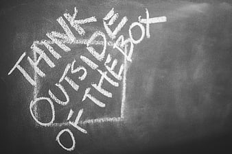 Think outside the box chalkboard text concept
