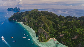 Aerial View of Tropical Island with Turquoise Water and Boats
