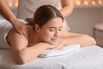 Relaxed Woman Receiving Spa Massage Treatment