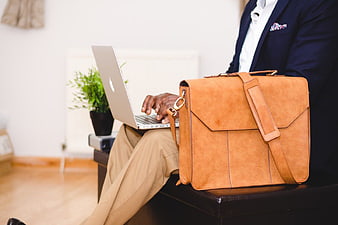 Businessman with Laptop and Leather Satchel