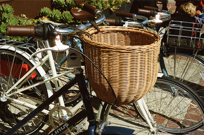 Vintage Bicycles with Wicker Basket Parked Outdoors