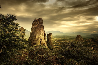 Dramatic Rock Formations in Greek Valley Landscape