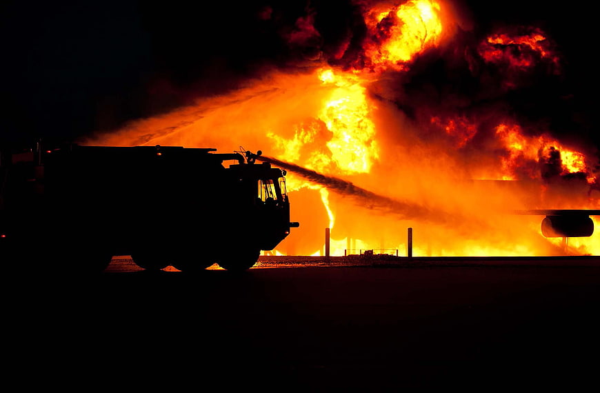 Fire Truck Silhouette Extinguishing Massive Night Fire
