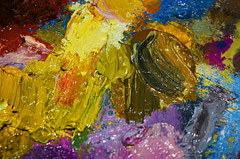 Close-up of colorful oil paint palette with thick texture