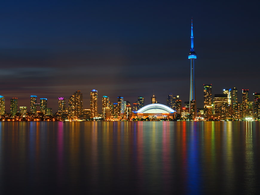 Toronto Skyline Night View With CN Tower And Water Reflections