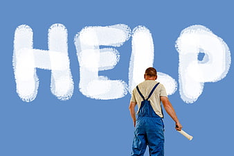 Man painting the word HELP in white clouds against a blue sky