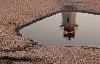 Lighthouse Reflection in Rocky Tide Pool