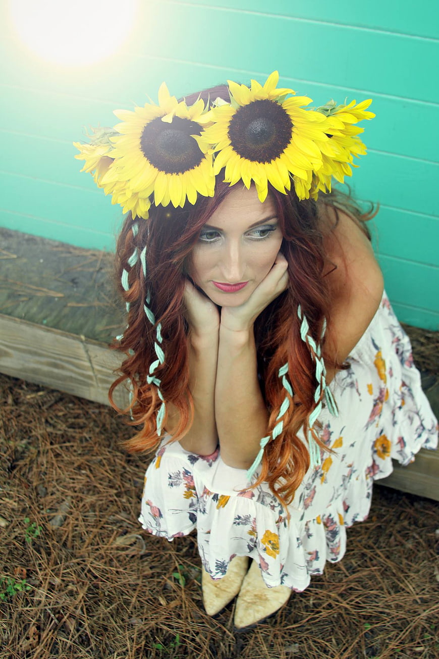 Woman with Sunflower Crown and Braided Hair