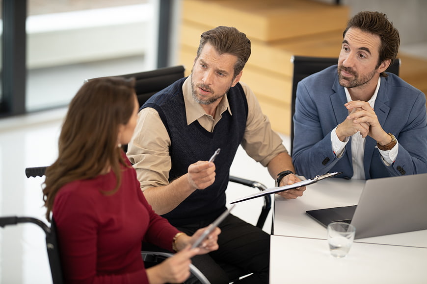 Business team meeting discussion in modern office