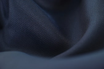 Close-up of dark blue textured fabric weave