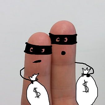 Finger puppets dressed as thieves holding money bags