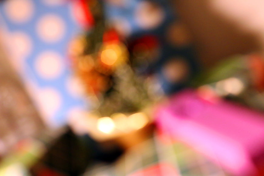 Blurred Christmas Gifts and Lights Background
