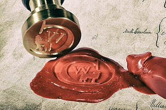 Vintage Wax Seal Stamp on Old Parchment Map