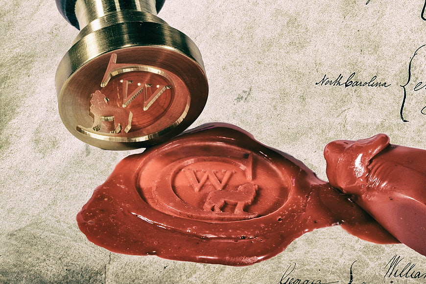 Vintage Wax Seal Stamp on Old Parchment Map