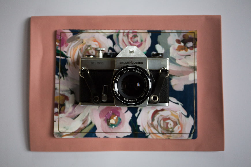 Vintage Argus/Cosina Camera on Floral Background