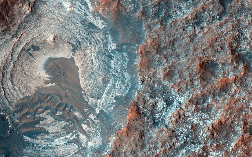Aerial view of Mars surface with dunes and craters