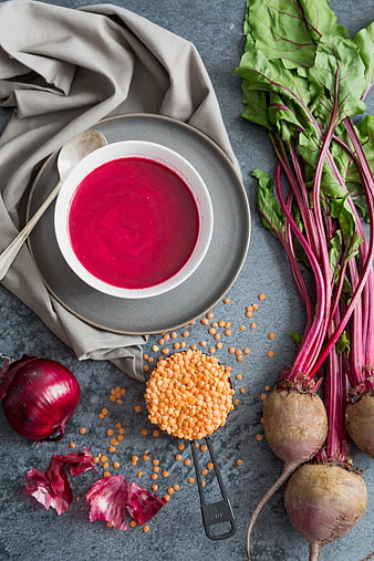 Top View of Vibrant Beet and Lentil Soup with Fresh Ingredients