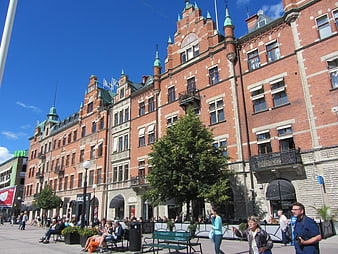 Historic Red Brick Building Facade In European City Square
