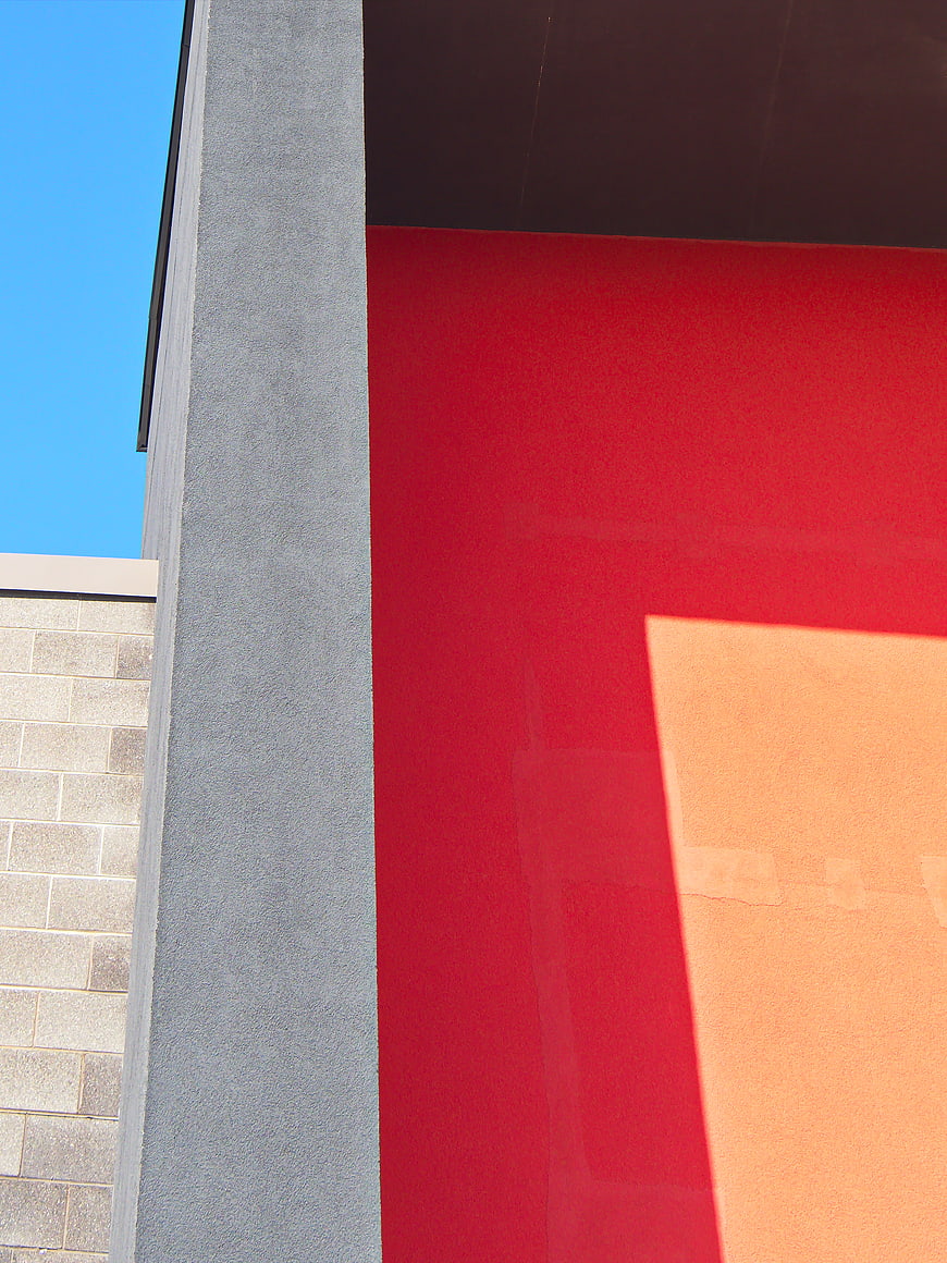 Modern Abstract Architecture with Red and Gray Walls