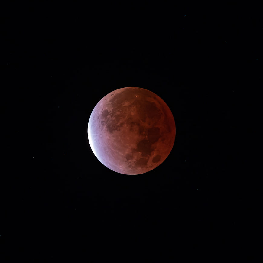 Blood Moon Lunar Eclipse in Night Sky