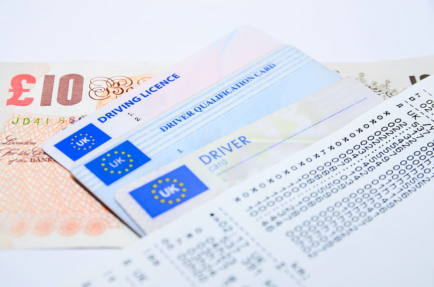 UK Driving License, Driver Card, and Tachograph Printout with Banknote