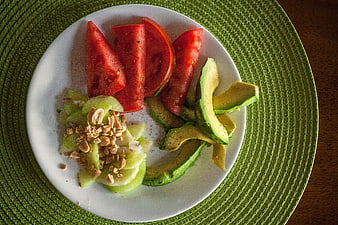 Healthy Avocado and Tomato Salad on White Plate