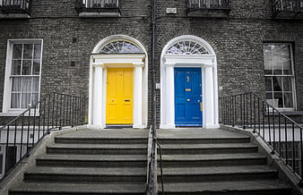 Colorful yellow and blue doors on Georgian Dublin architecture