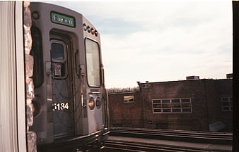 Vintage Film Photo of Subway Train at Urban Station