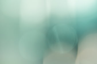 Soft Teal and White Abstract Bokeh Background