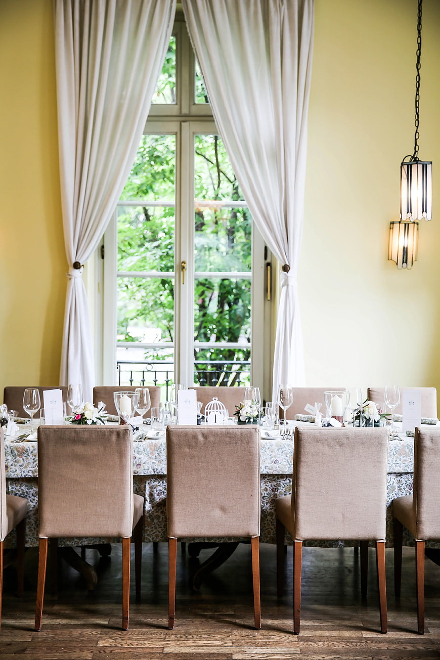 Elegant Dining Table Setting with Floral Linen and Natural Light