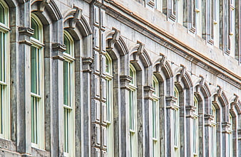 Ornate Gothic Revival Building Facade with Arched Windows