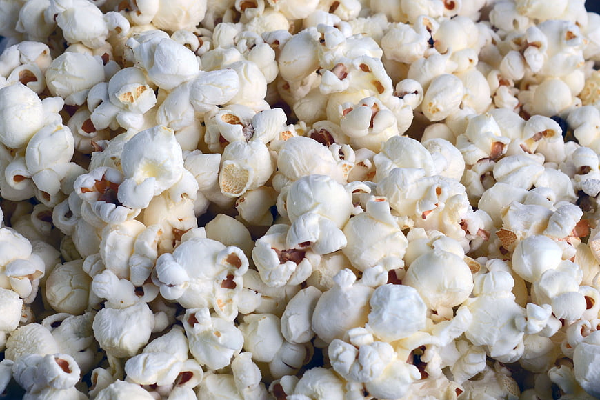 Close-up texture of fluffy white popcorn snack