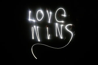 Love Wins Light Painting on Black Background