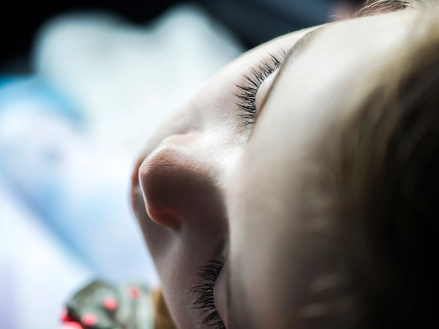 Close-up of sleeping baby face with soft lighting