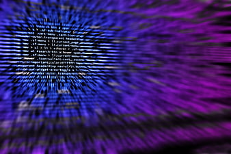 Abstract digital code background with blue and purple motion blur
