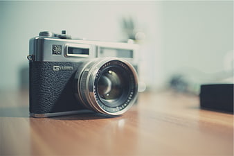 Vintage Yashica SLR Camera on Wooden Table